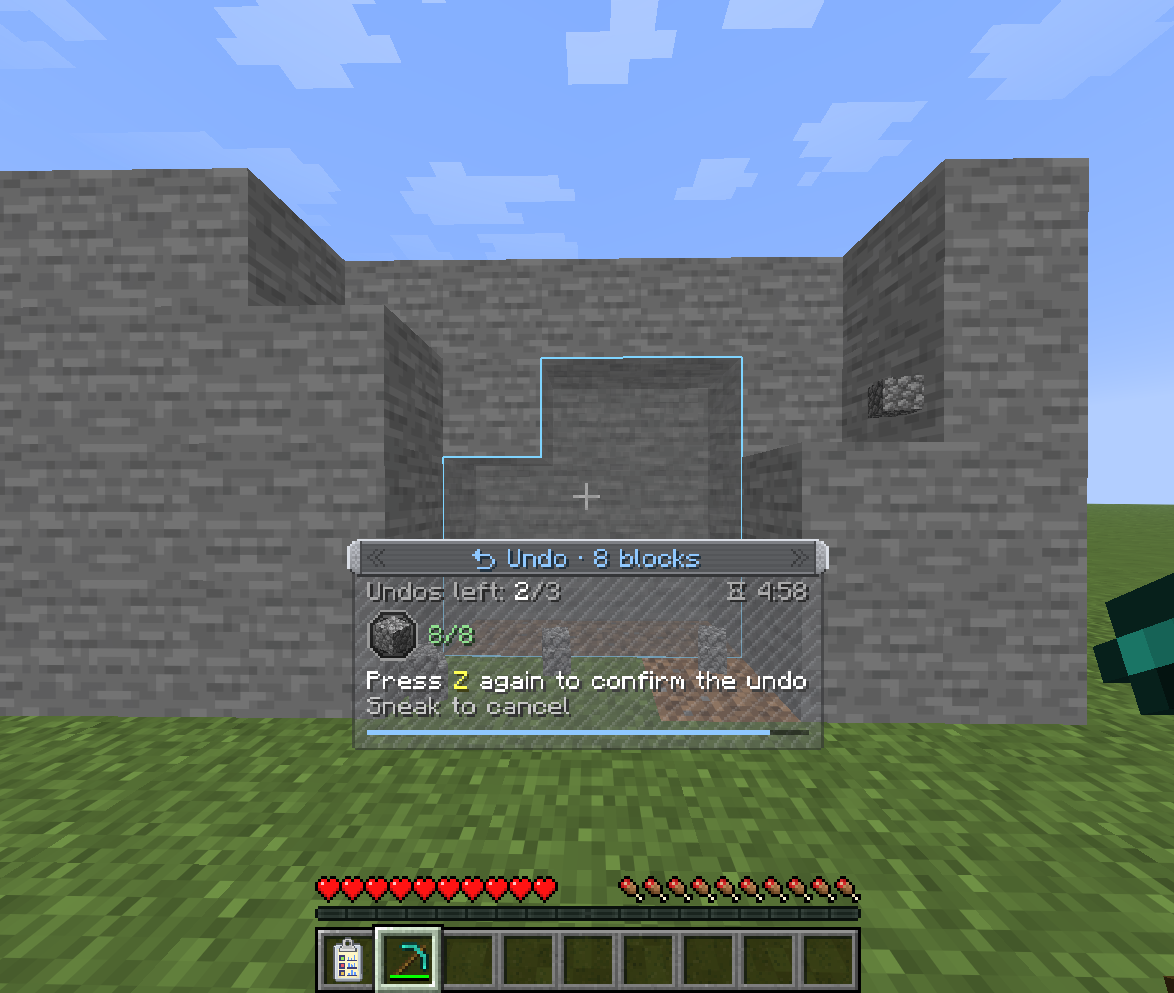 The undo preview: an outline of the blocks that return and the HUD listing the cost